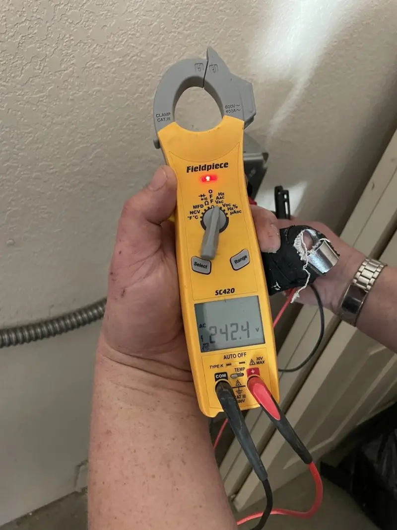 Voltage testing with clamp meter during Generator Installation in West Athens